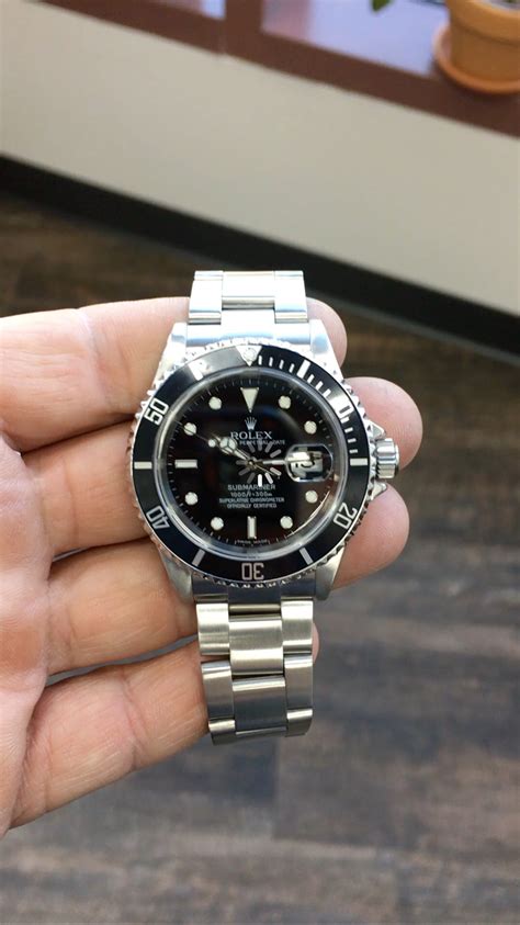 rolex submariner ss black dial|all black Rolex Submariner price.